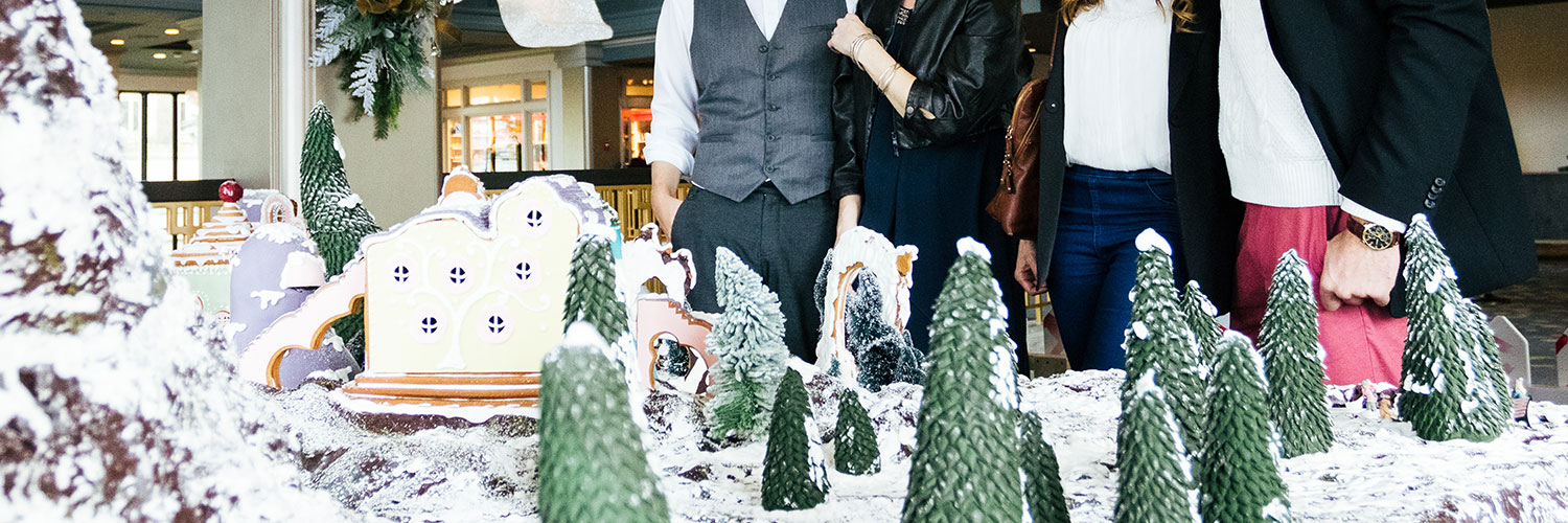 Couples looking at Gingerbread Display